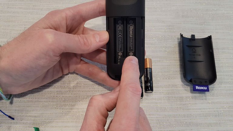 Place the Batteries in Correct Spot