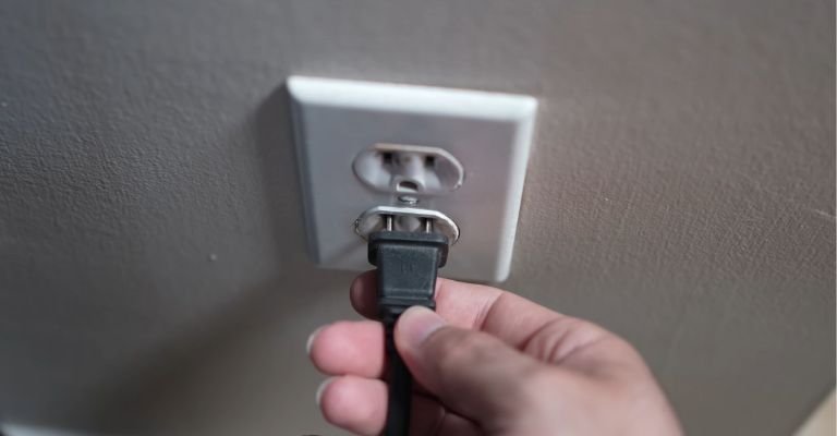 Plug into Another Outlet Plug into Another Outlet