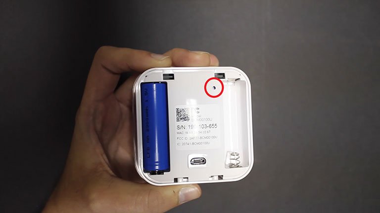 Use a Toothpick to Press and Hold the Reset Button Use a Toothpick to Press and Hold the Reset Button